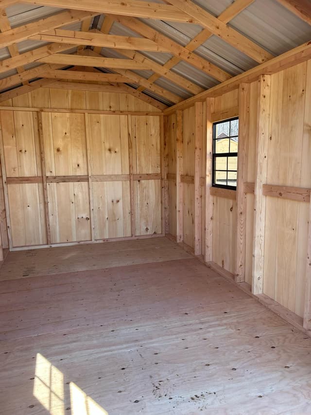  Side picture of a tiny home on a trailer 